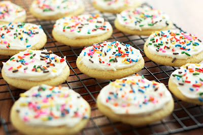 Cornbread Sugar Cookies with Honey Butter Frosting and sprinkles