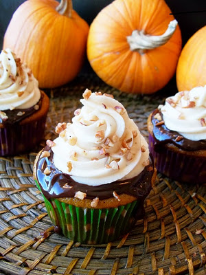 Delicious pumpkin cupcakes with chocolate ganache