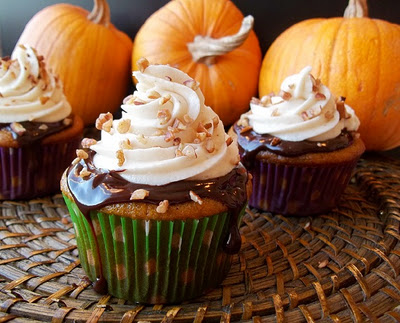 Pumpking cupcakes with chocolate ganache and spiced cream cheese frosting
