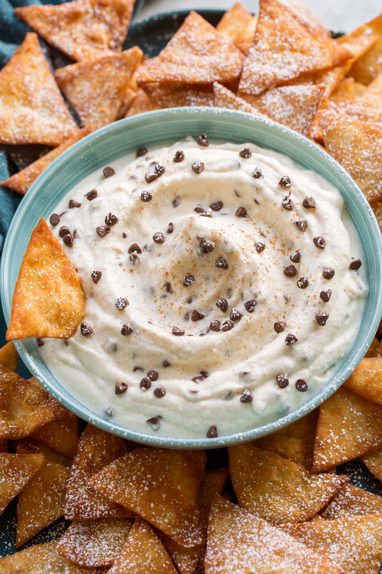 Close up photo of cannoli dip with chocolate chips.