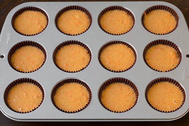 Showing how to make carrot cake cupcakes.