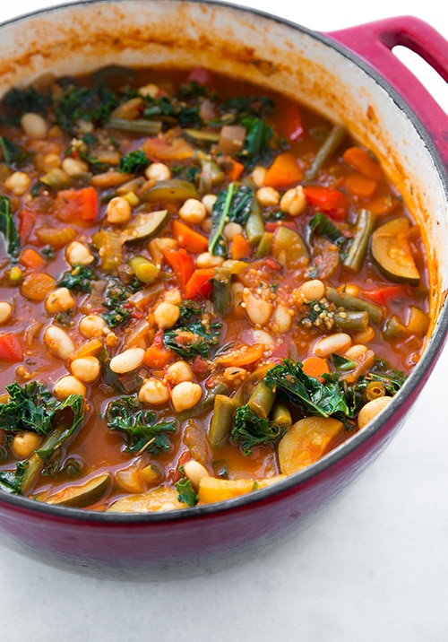 A warm and cozy soup, this Kale + Quinoa Minestrone is healthy and freezer-friendly! {gluten-free + vegan}