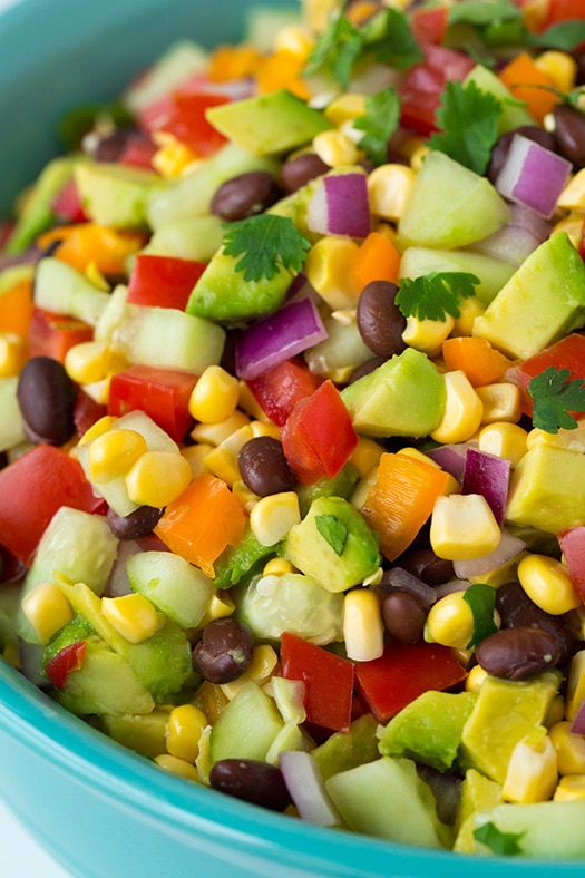 close up of Mexican chopped salad in blue bowl