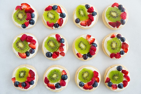 Mini Fruit Pizzas with Lemon Cream Cheese Frosting | Cooking Classy