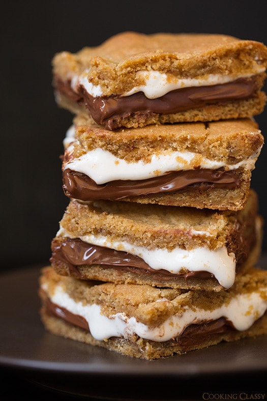 four S'mores Bars stacked on a gray plate