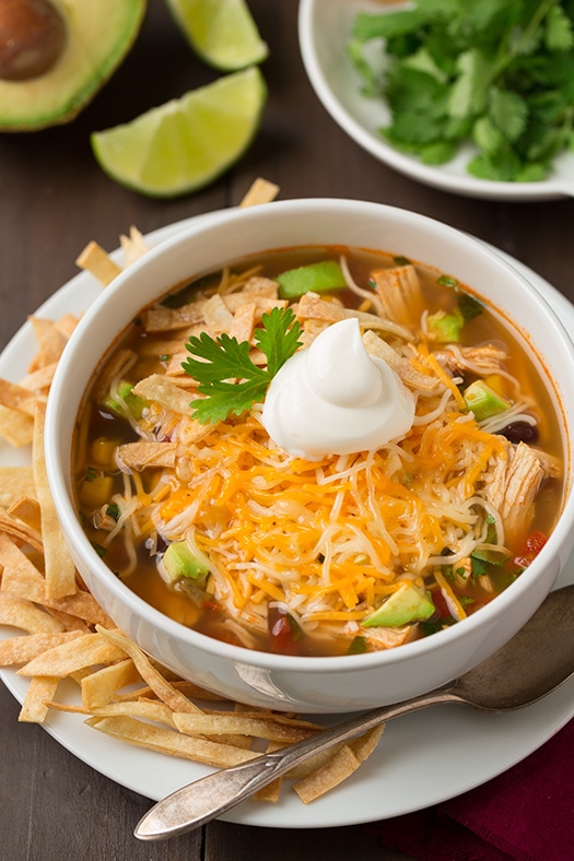Chicken Tortilla Soup topped with cheese and sour cream