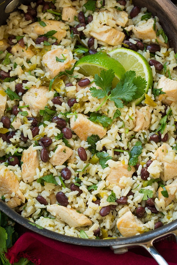 One Pan Cilantro Lime Chicken and Rice with Black Beans in a skillet pan