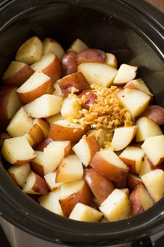 Potatoes and garlic after cooking in slow cooker.