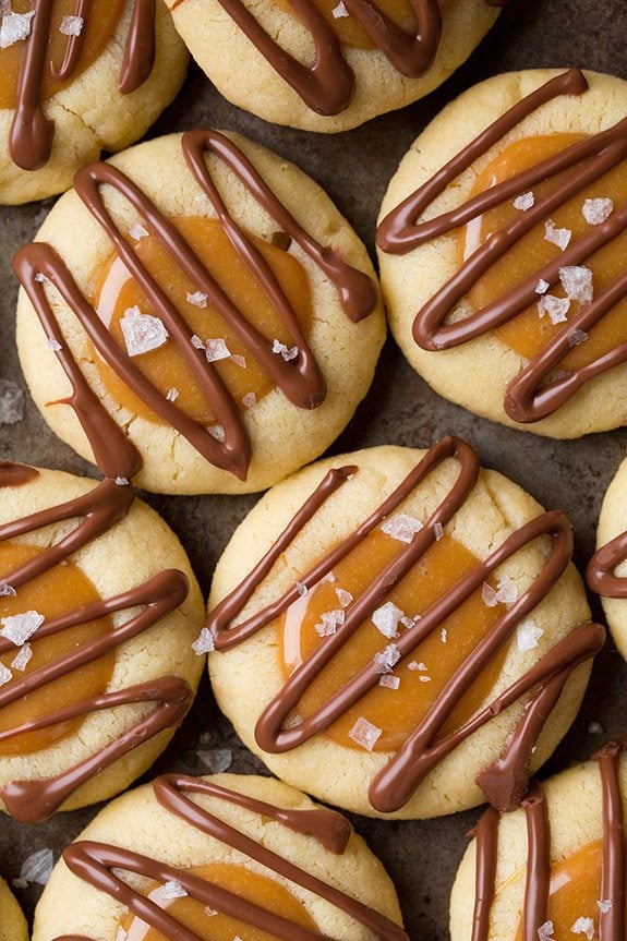 Thumbprint cookies filled with caramel and drizzled with chocolate.