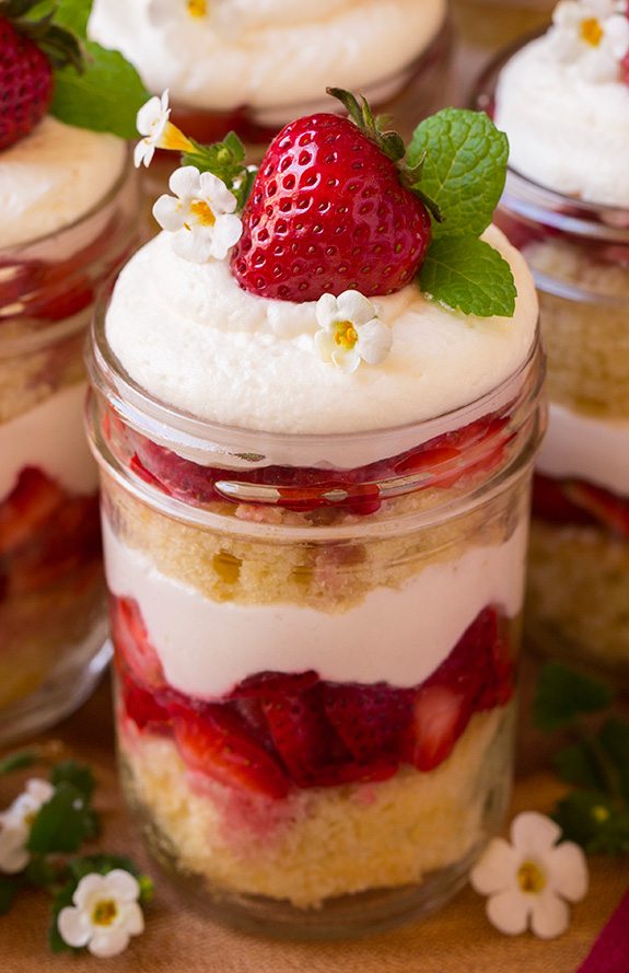 close up of individual Strawberry Shortcake Trifle garnished with whole strawberry