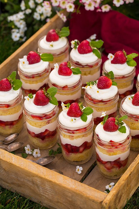 Strawberry Shortcake Trifles in wooden tray with spoons