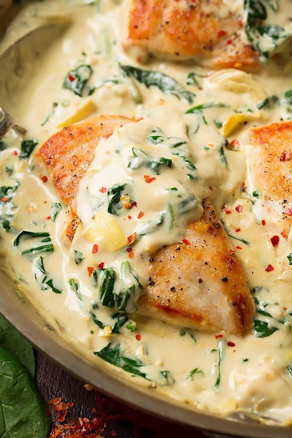 Skillet Chicken with Creamy Spinach Artichoke Sauce | Cooking Classy.