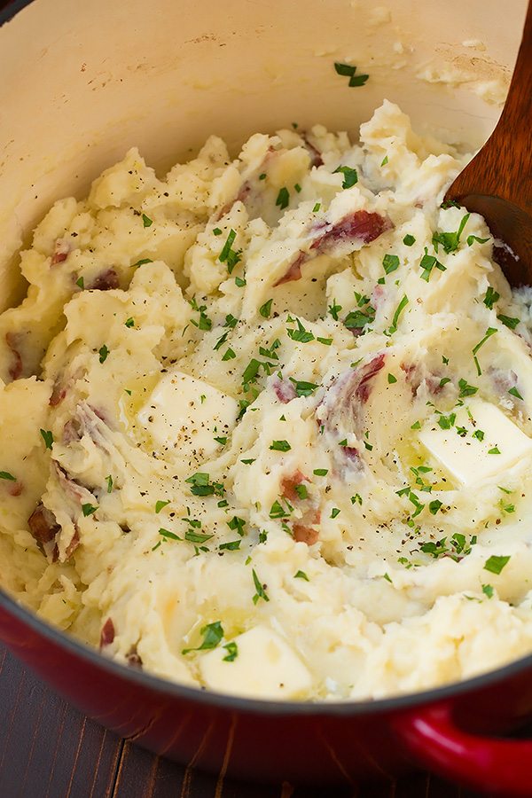 Garlic mashed potatoes with butter in a pot.