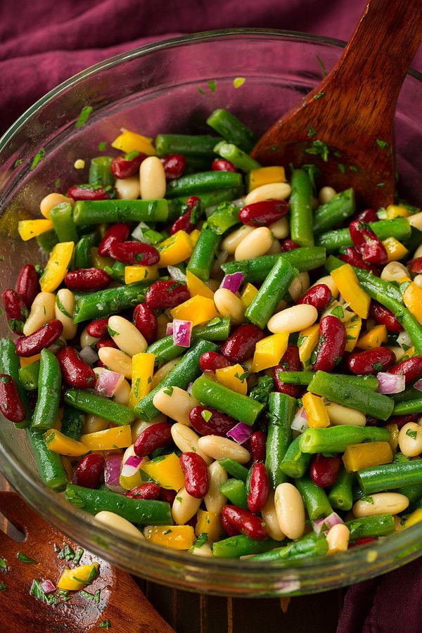 Three Bean Salad in a glass serving bowl.