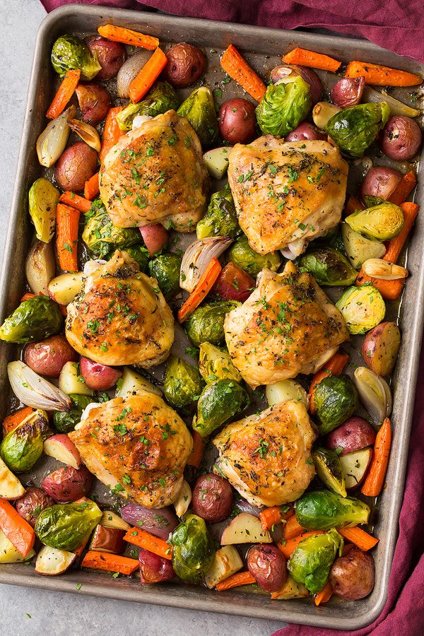 Roasted Chicken with Root Vegetables on baking sheet after baking.