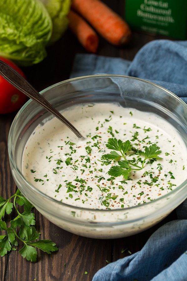 homemade buttermilk ranch dressing in glass mixing bowl