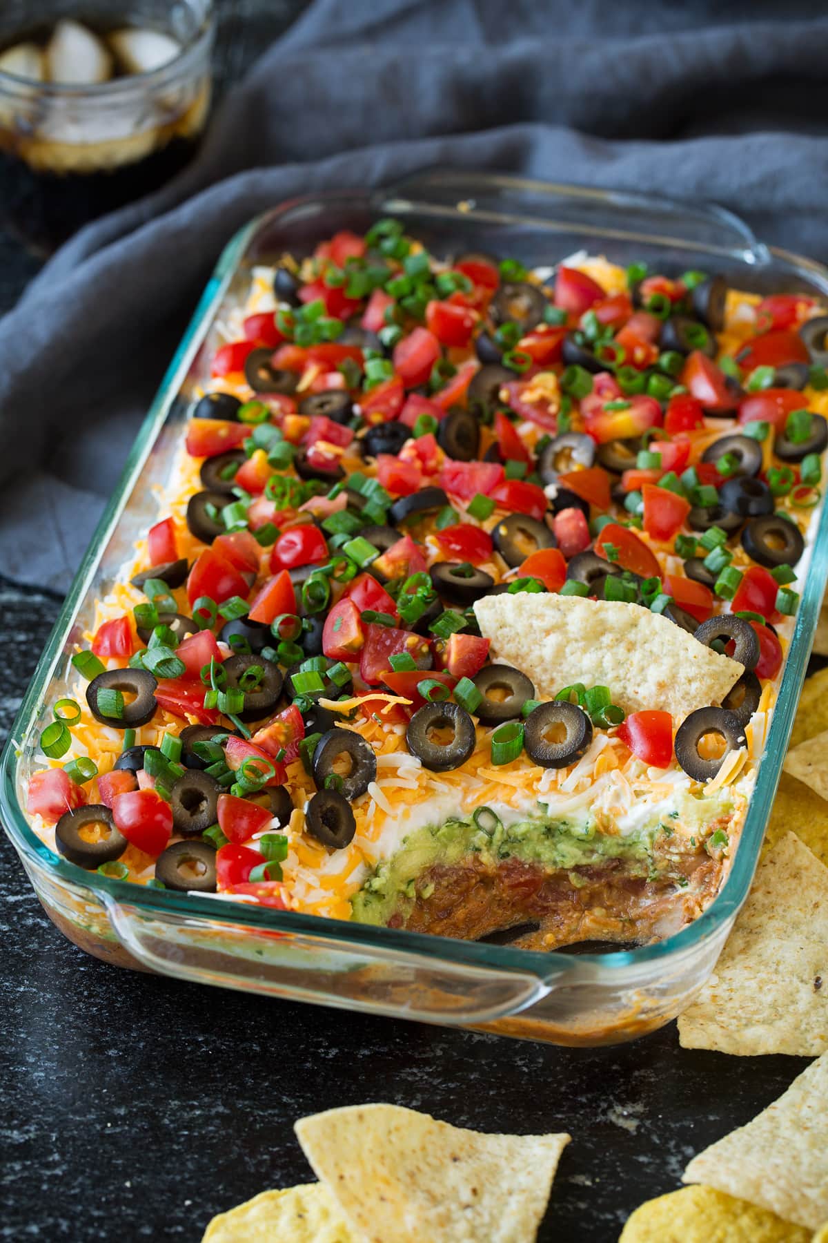 7 Layer Dip in a glass baking dish.