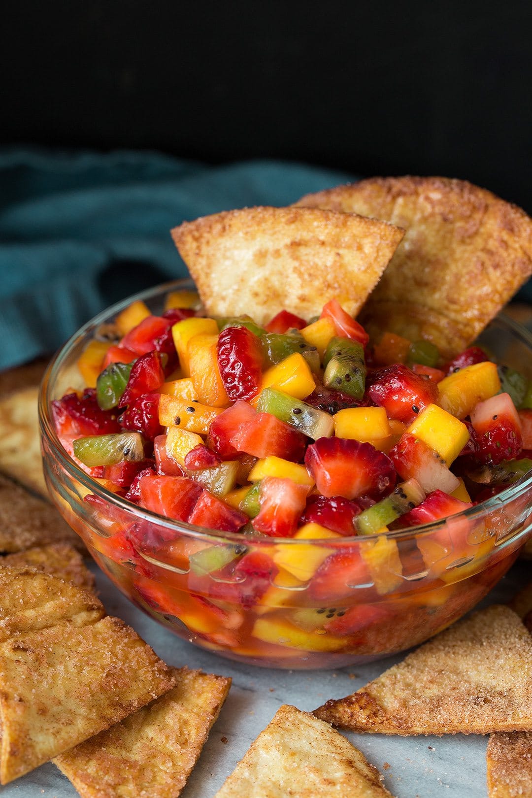 bowl of fruit salsa with baked cinnamon chips