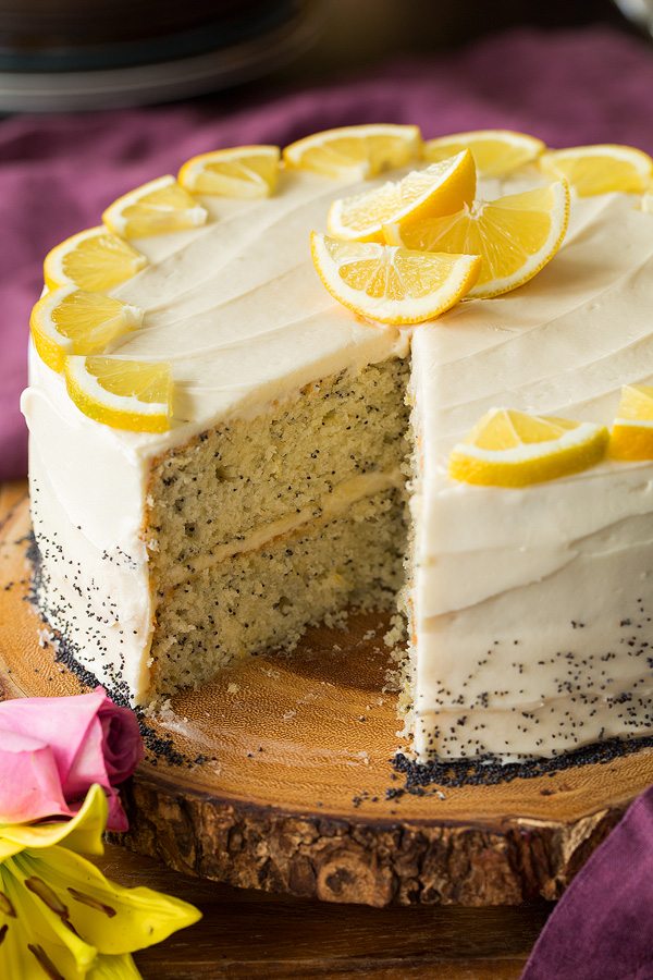 Lemon Poppy Seed Cake with cream cheese frosting and lemon slices on top
