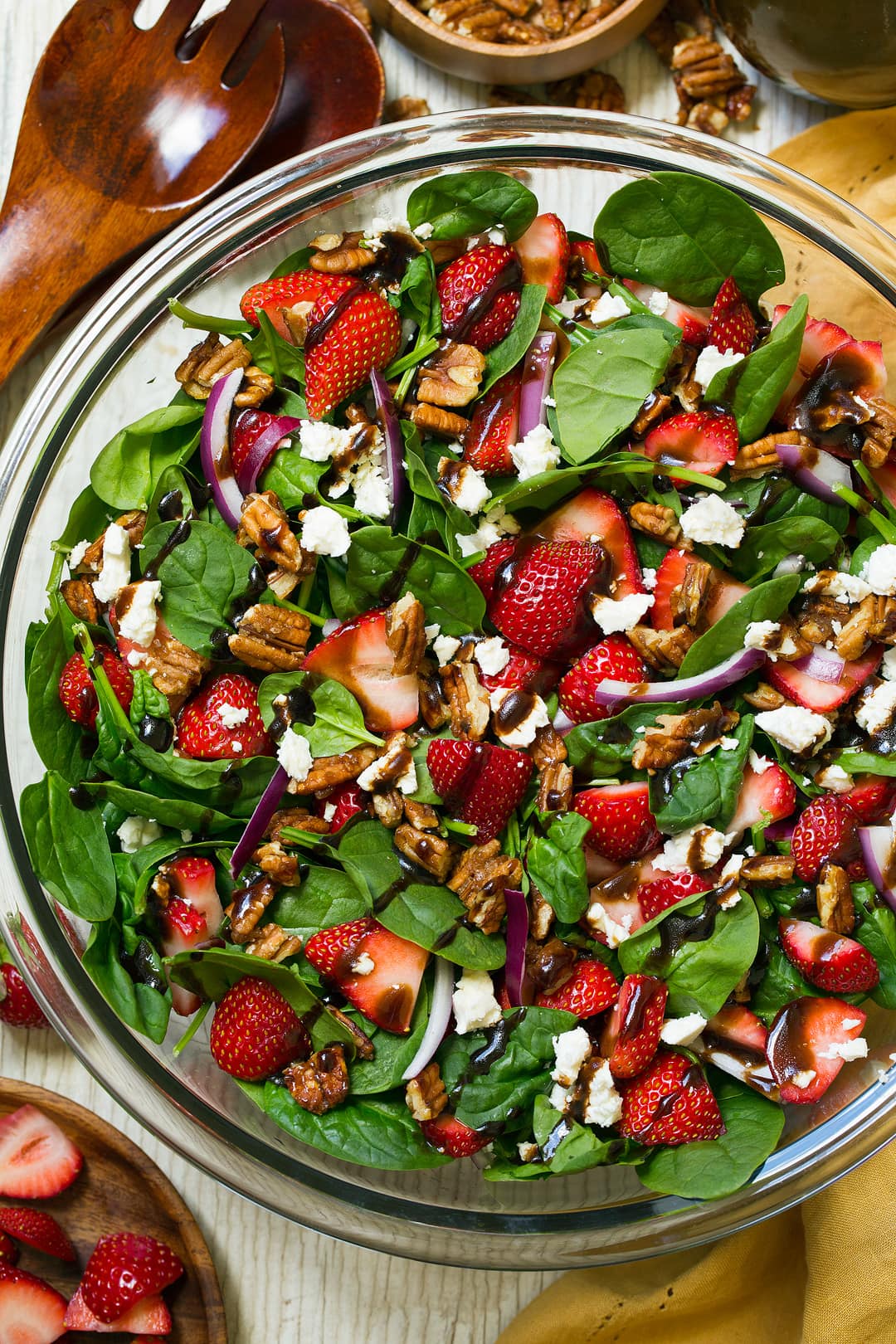 Strawberry Spinach Salad in a glass bowl with a balsamic dressing
