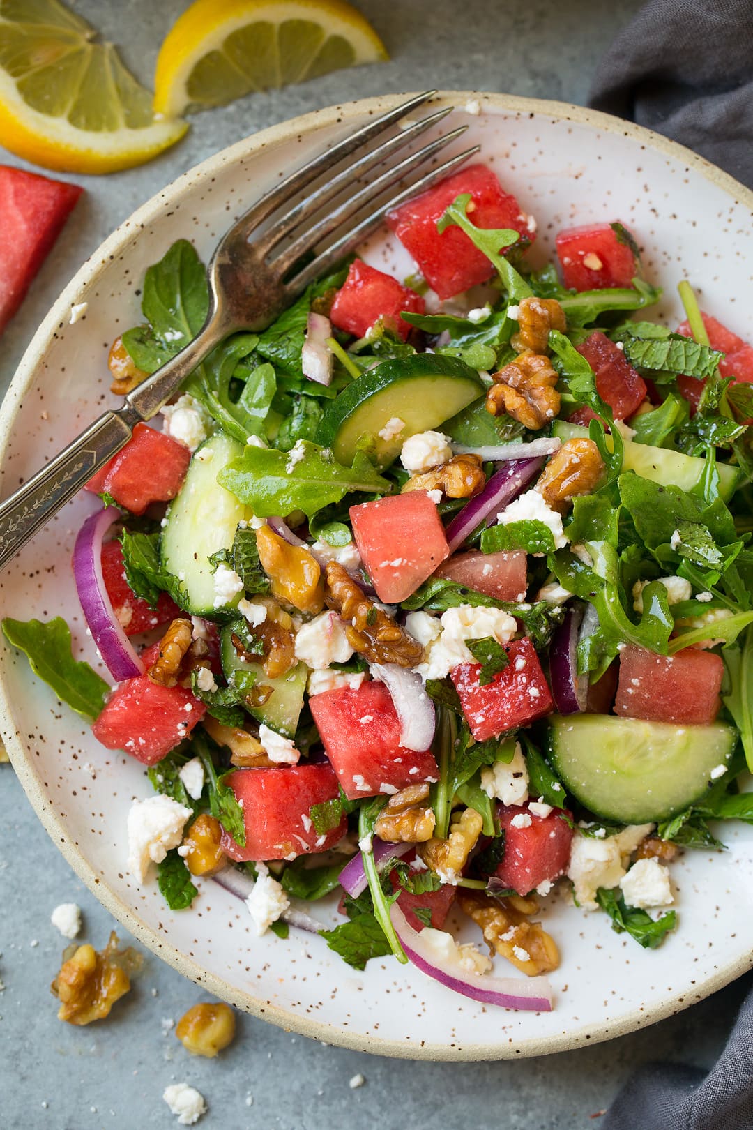 plate of watermelon cucumber salad with feta