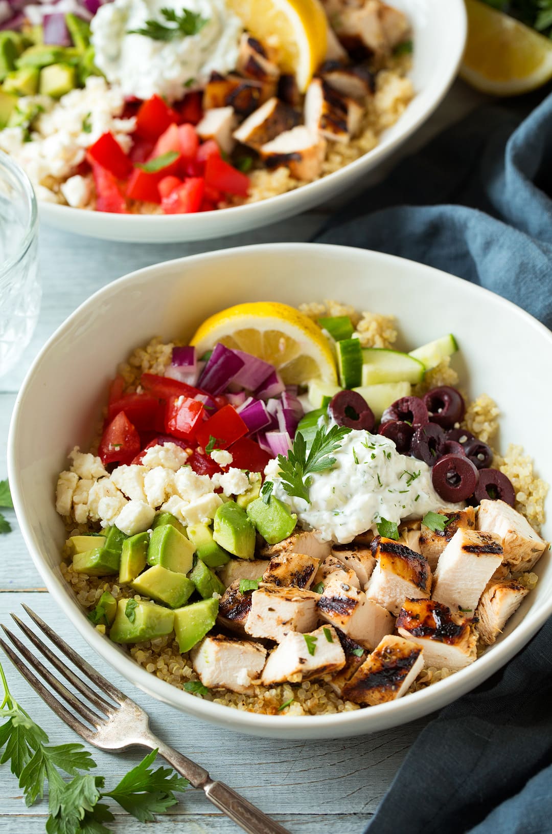 two Grilled Greek Chicken Quinoa Bowls