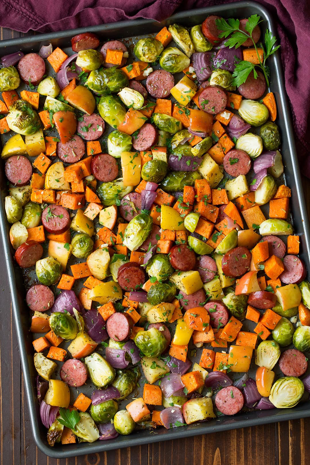 Sheet Pan Dinner with Turkey Sausage Sweet Potatoes Brussels Sprouts Apples and Red Onions