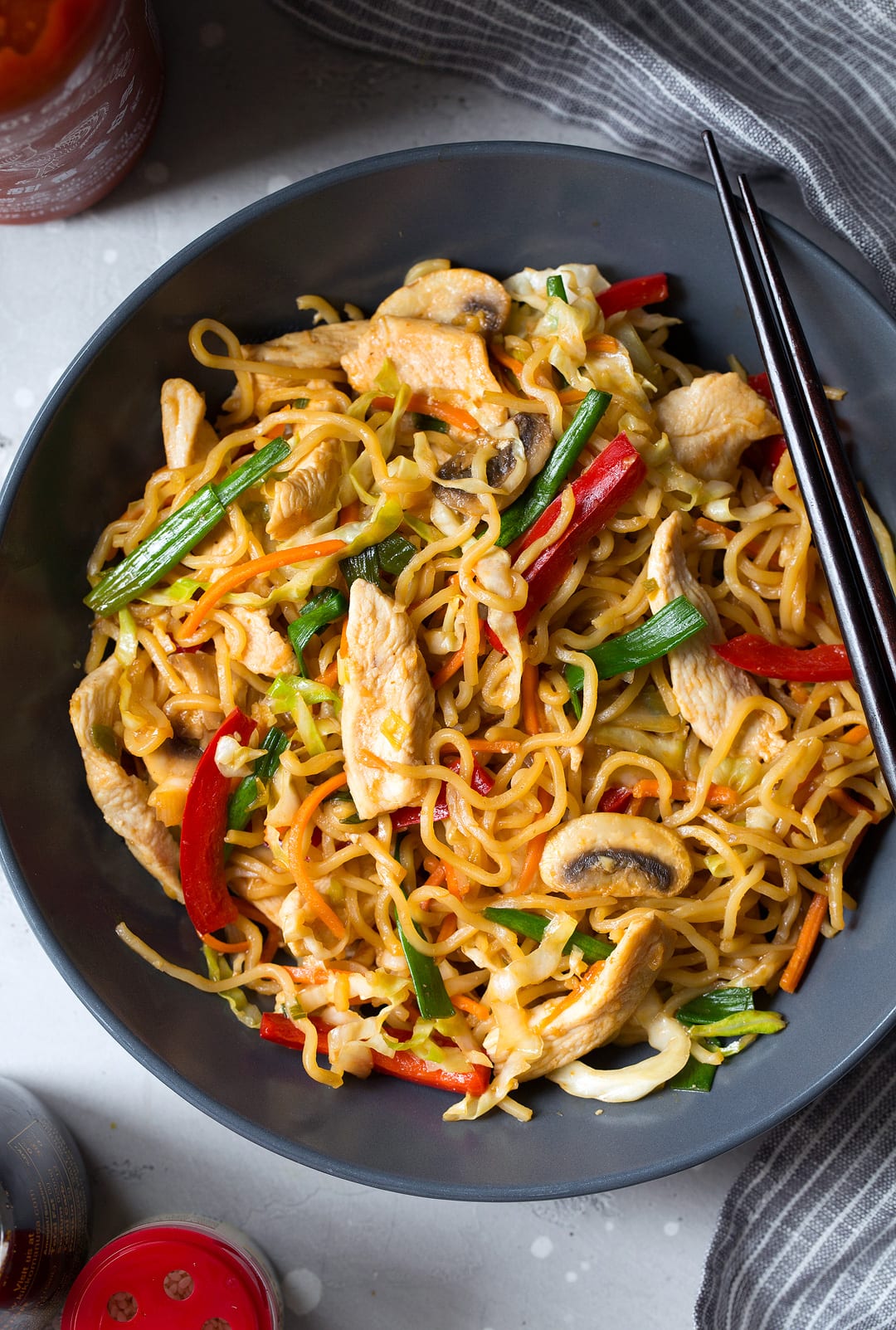 Chicken Yakisoba in gray bowl with chopsticks