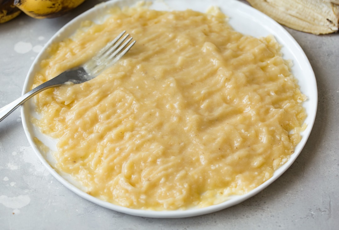 well mashed bananas for banana bread on a plate