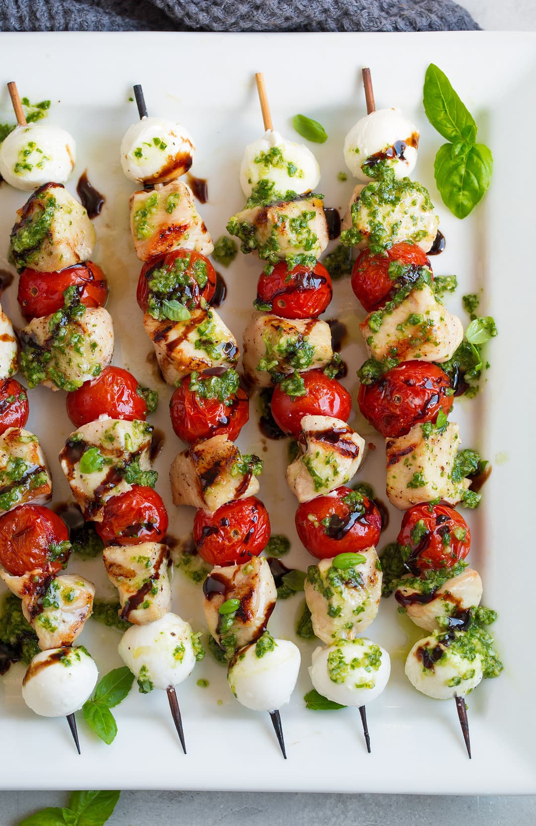 Chicken Caprese Skewers on white plate