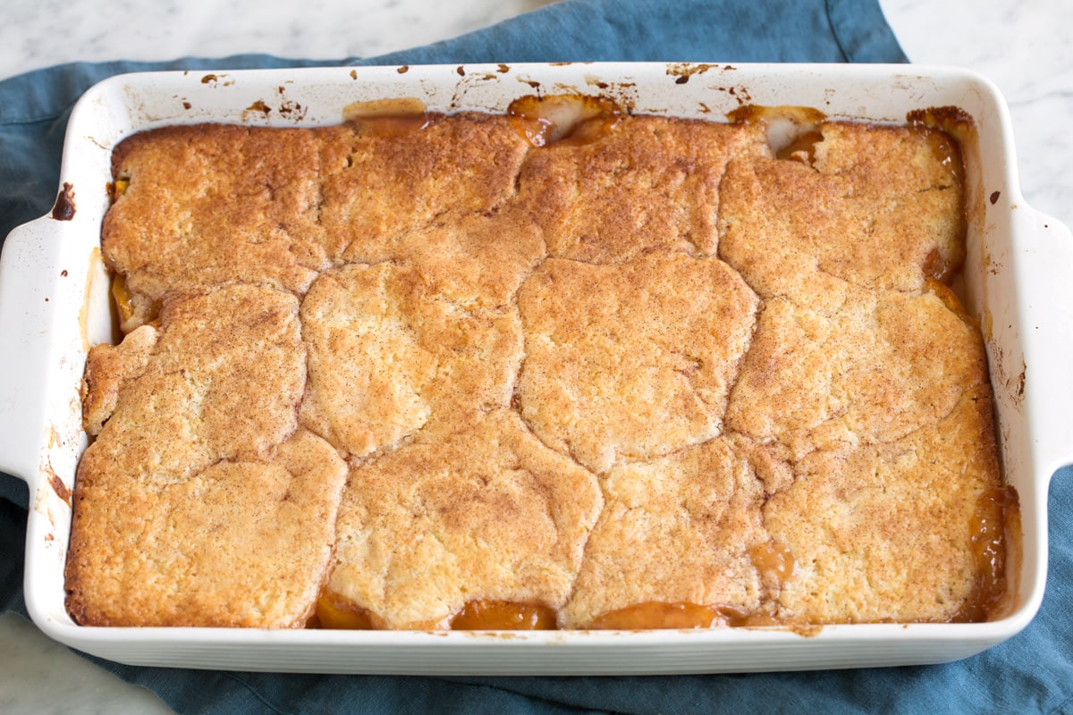 Finished peach cobbler shown after baking.
