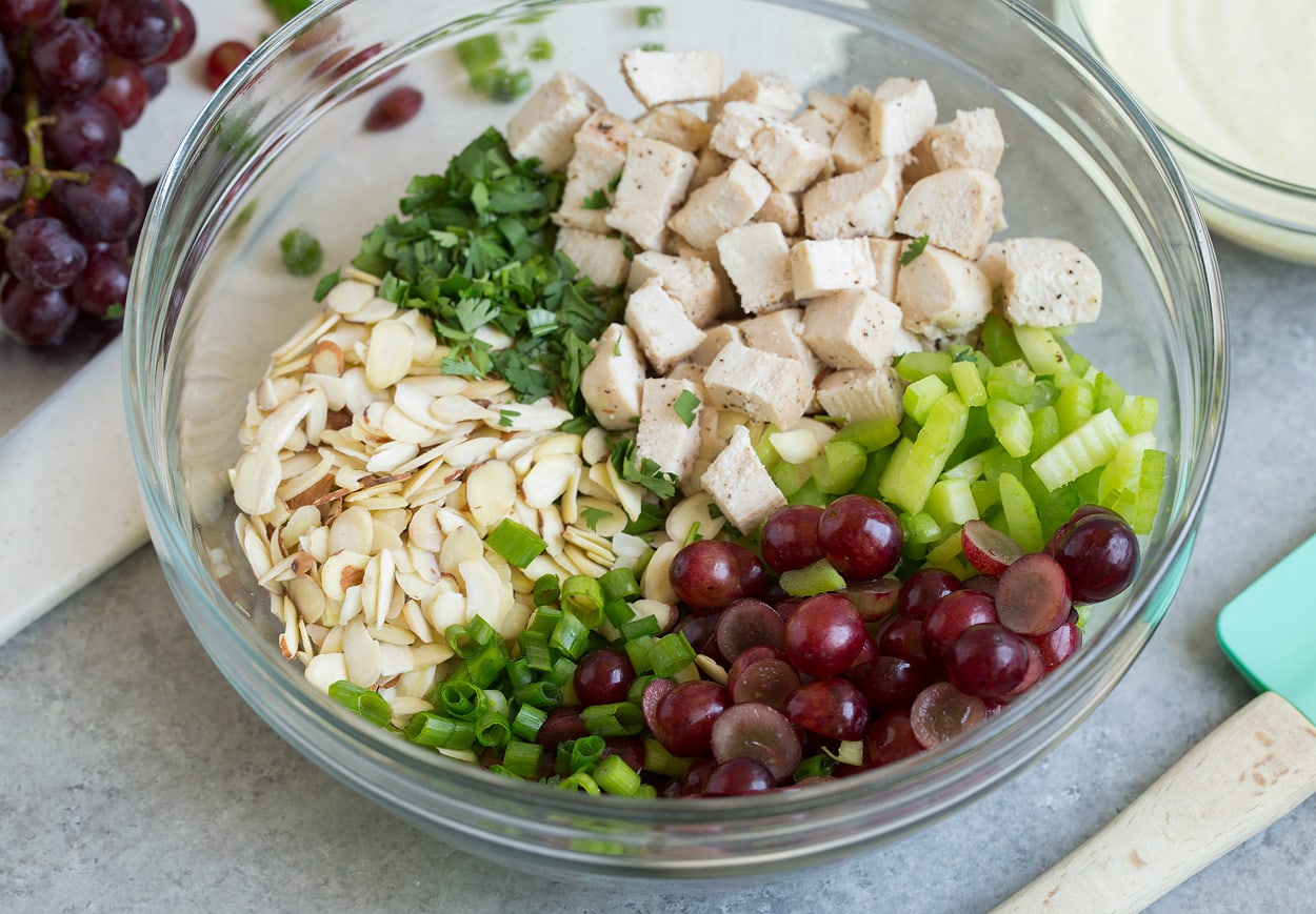 Curry Chicken Salad ingredients in a glass bowl