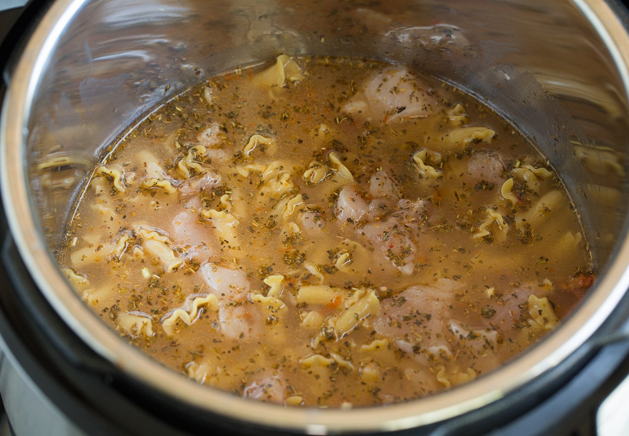 Instant Pot Chicken Broth adding in pasta and chicken to instant pot
