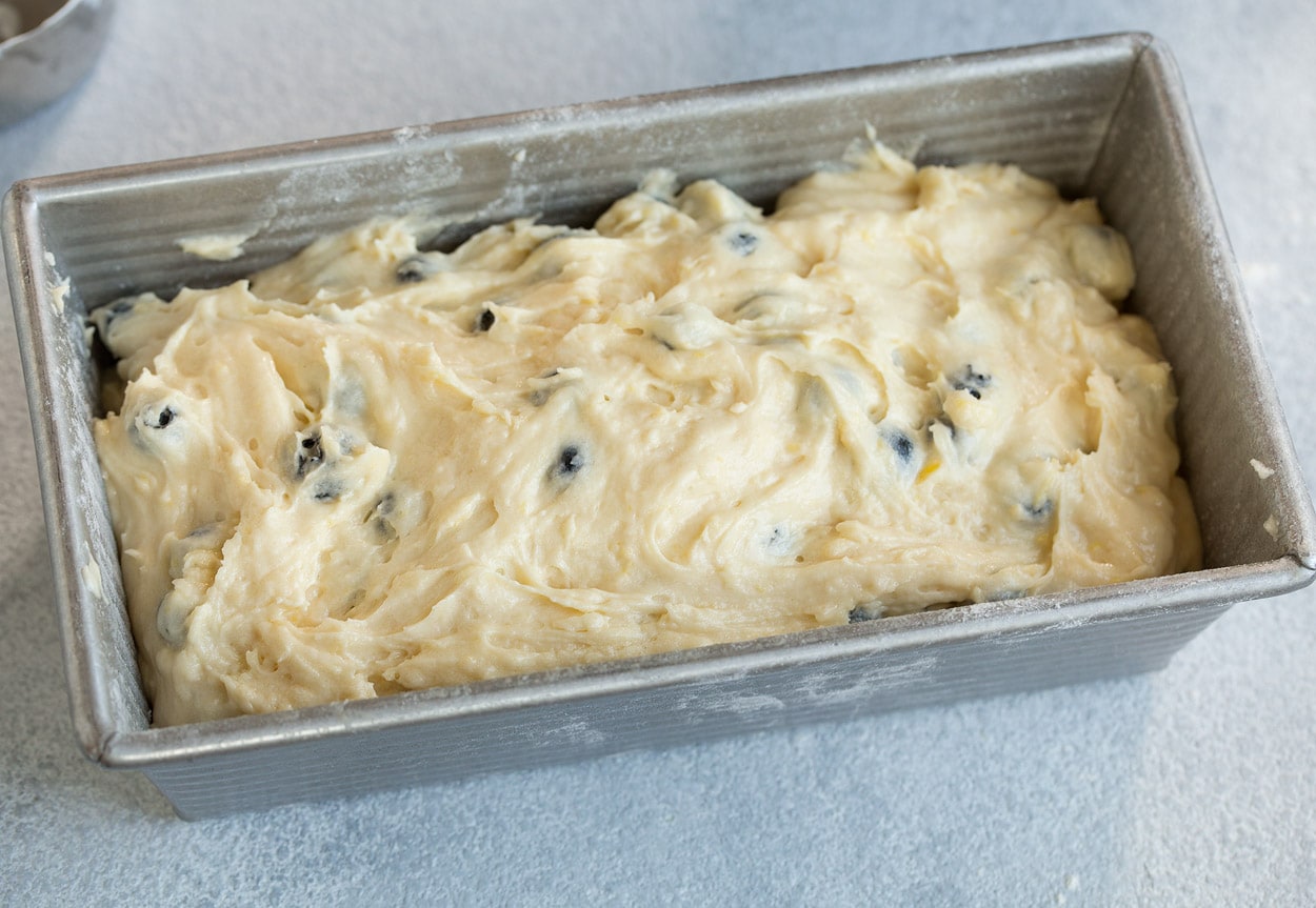 Lemon Blueberry Bread pouring mixture into loaf pan