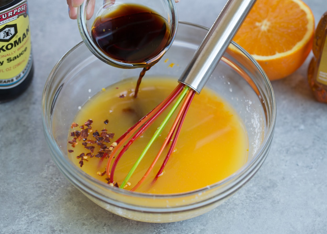 Orange Garlic Shrimp making orange stir fry sauce in mixing bowl