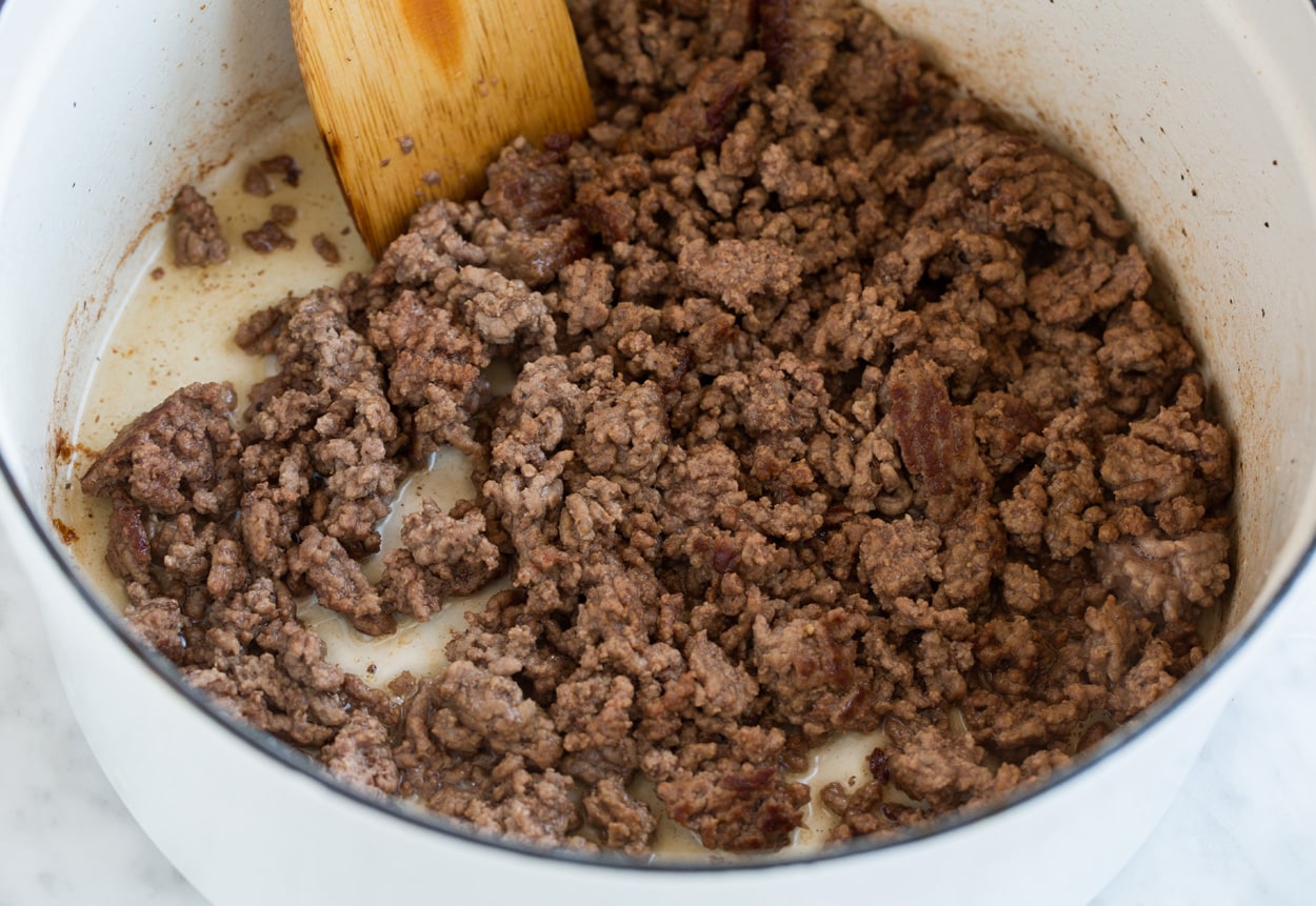 Browning ground beef in pot for lasagna soup.