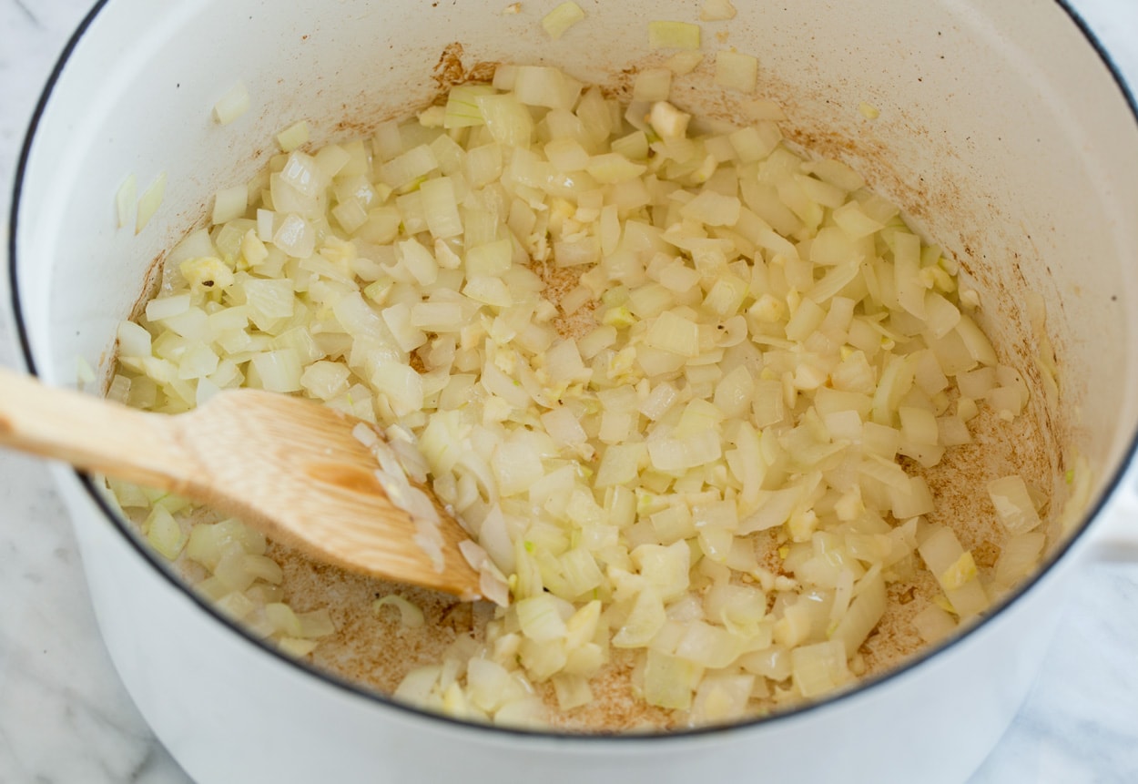 Sauteing onion and garlic for lasagna soup.