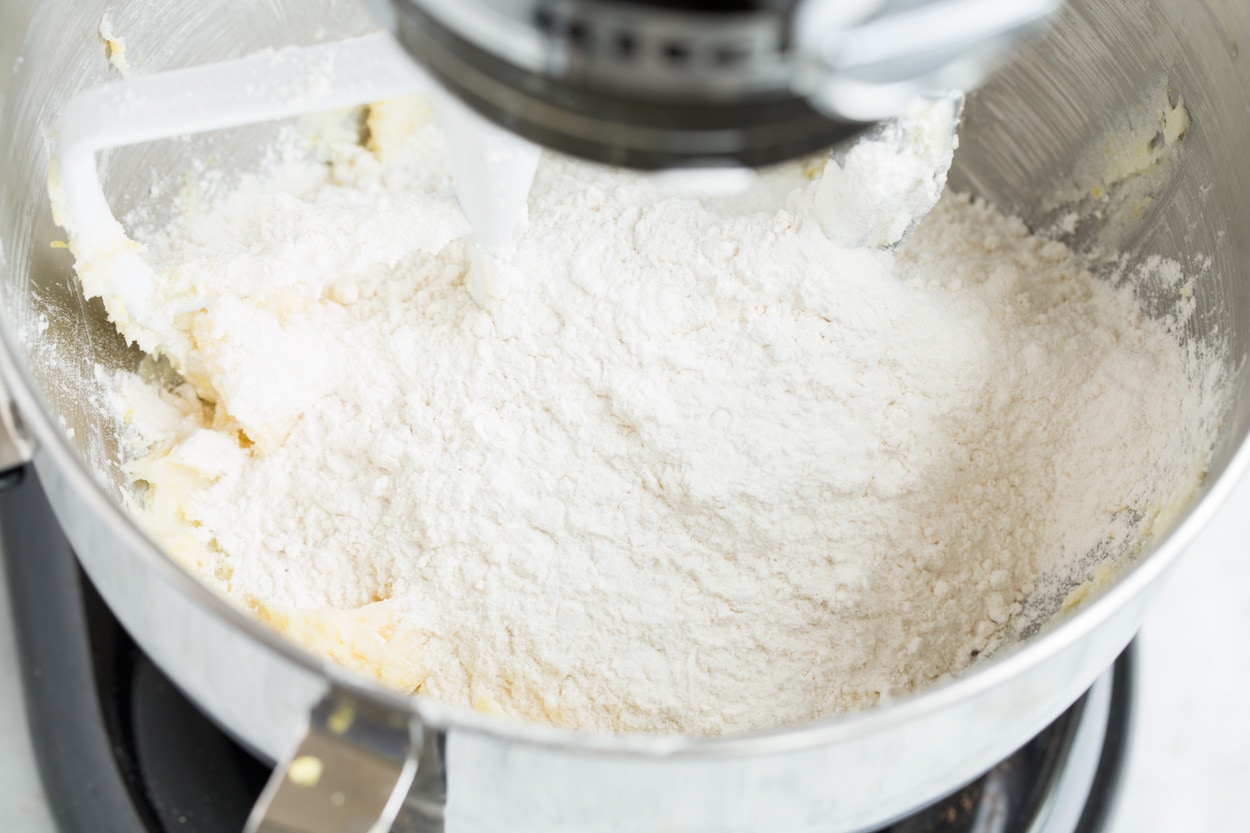 Mixing in flour to shortbread mixture.