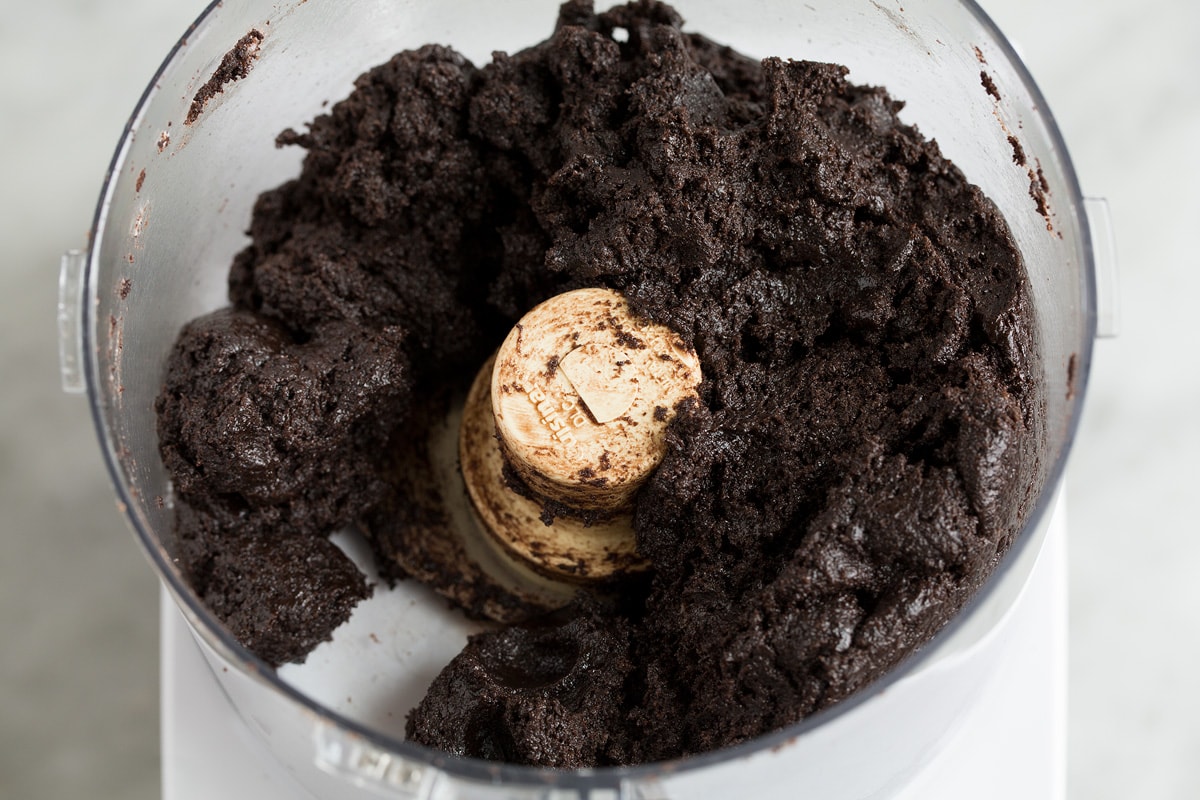 Blended oreo truffle mix in a food processor.