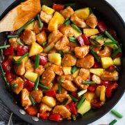 Overhead image of sweet and sour chicken in skillet.
