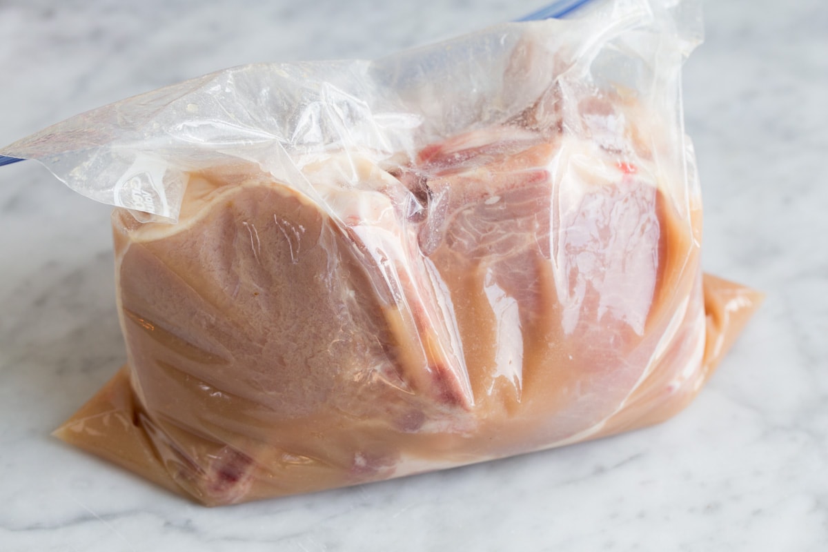 Pork chops in marinade in a resealable bag