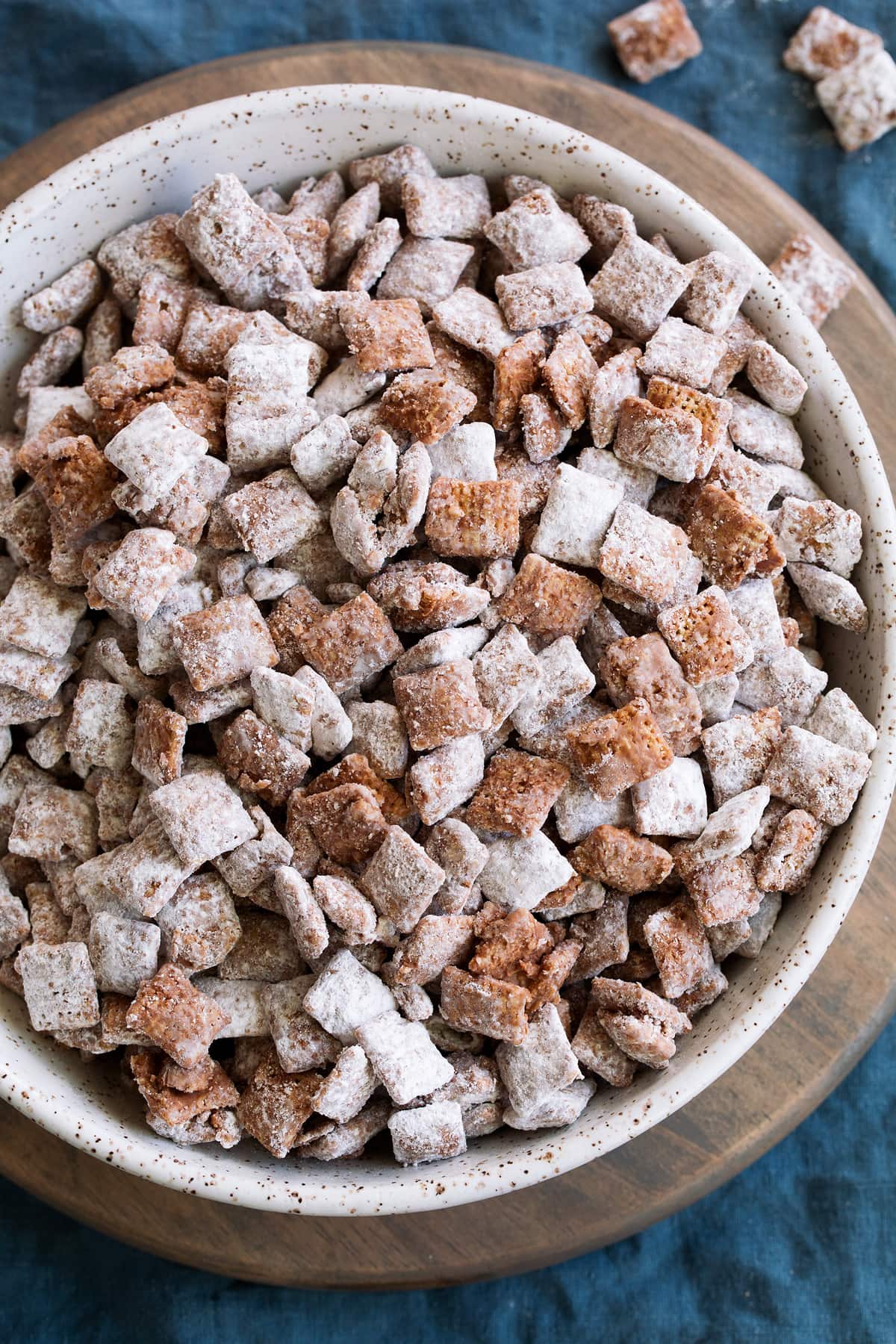Puppy chow muddy buddies in a serving bowl.