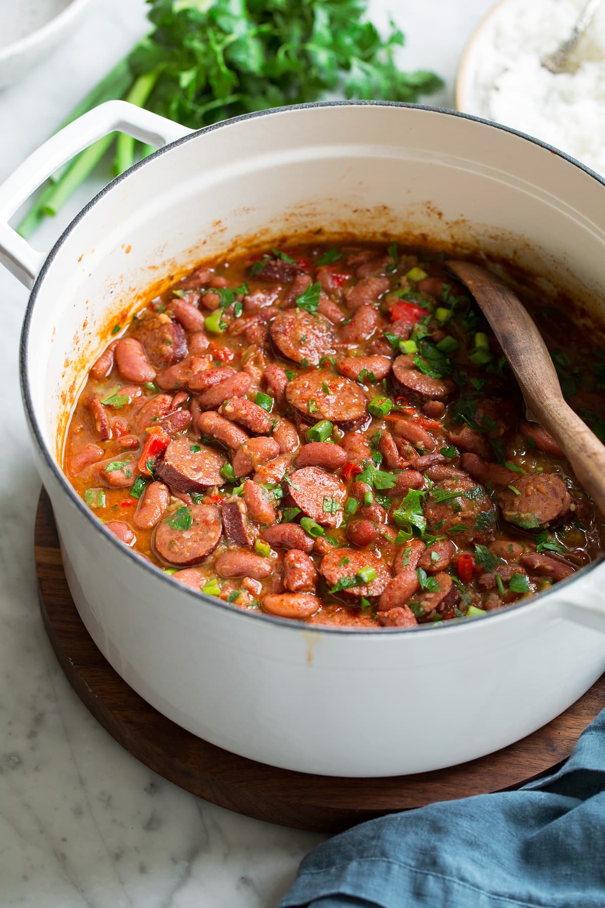 Pot full of red beans and sausage.