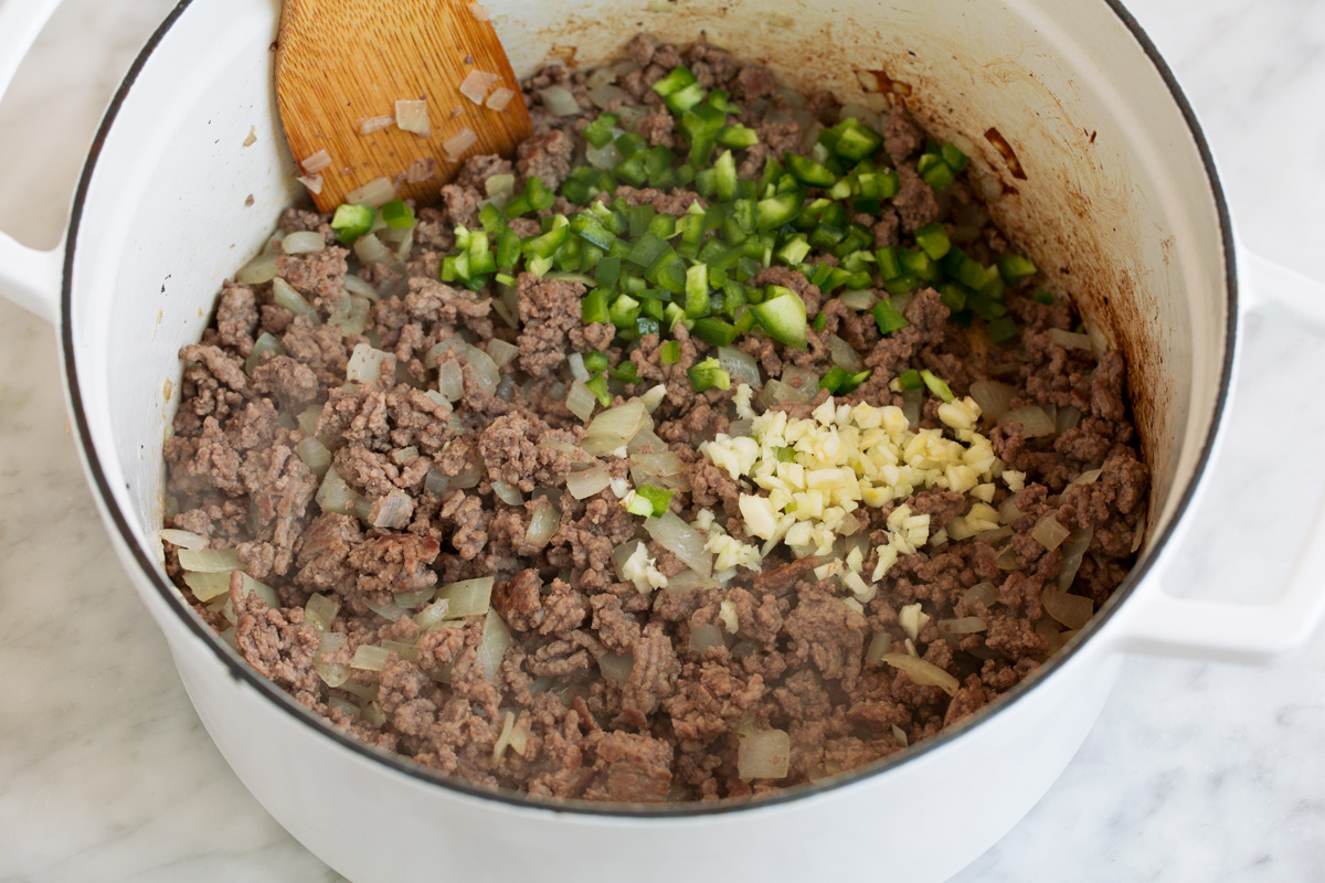 Browning beef, garlic, onion and jalapeno in a pot to make taco soup.
