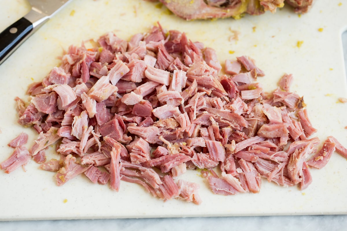 shredded ham on a cutting board