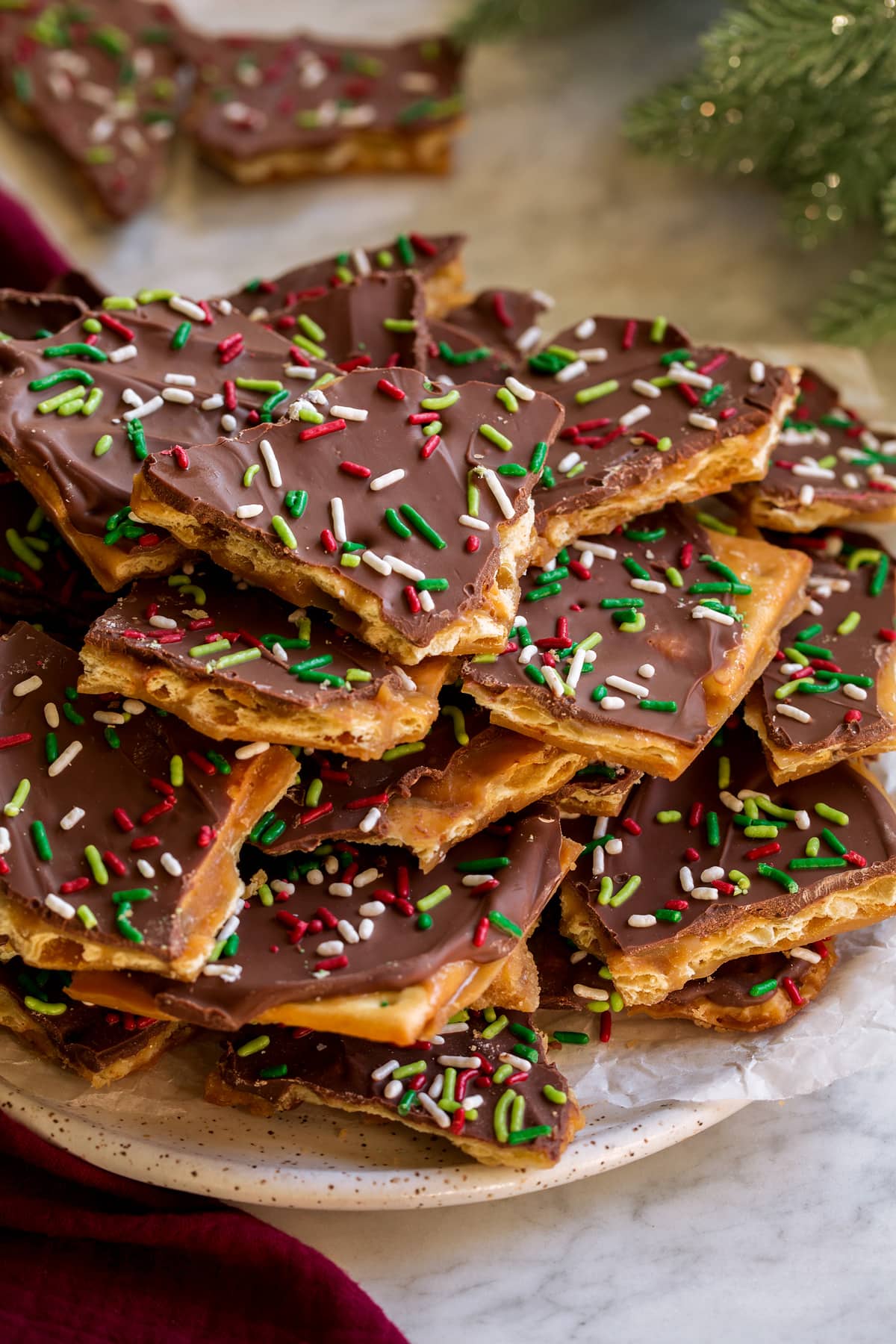 Christmas Crack layered on a serving plate.