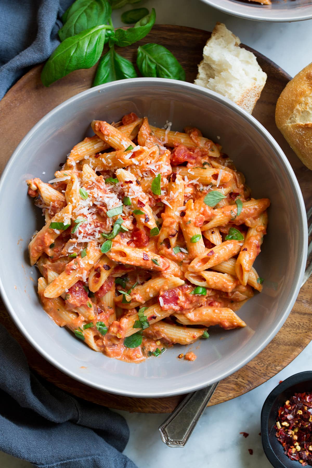 Pasta bowl filled with penne tossed with vodka sauce and garnished with fresh basil and oregano. Served with a side of fresh Italian bread.