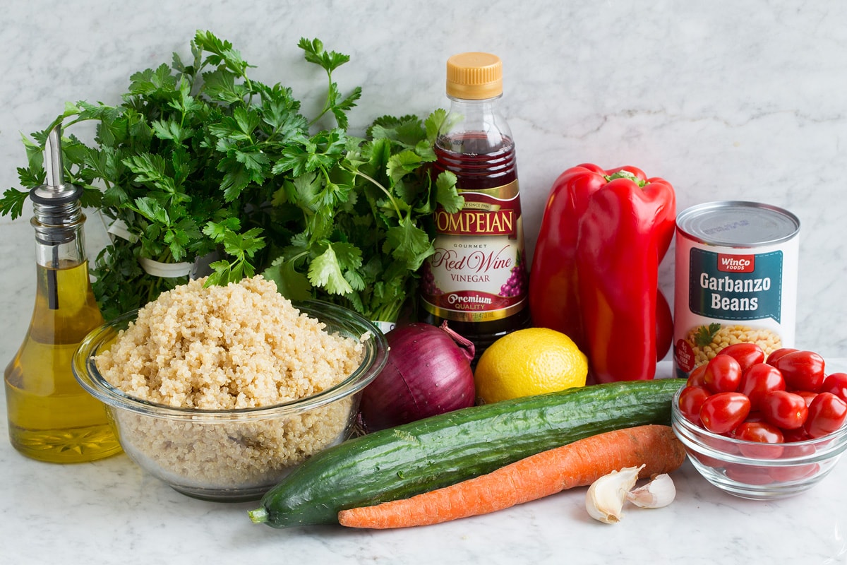 Ingredients that go into quinoa salad shown in this image.