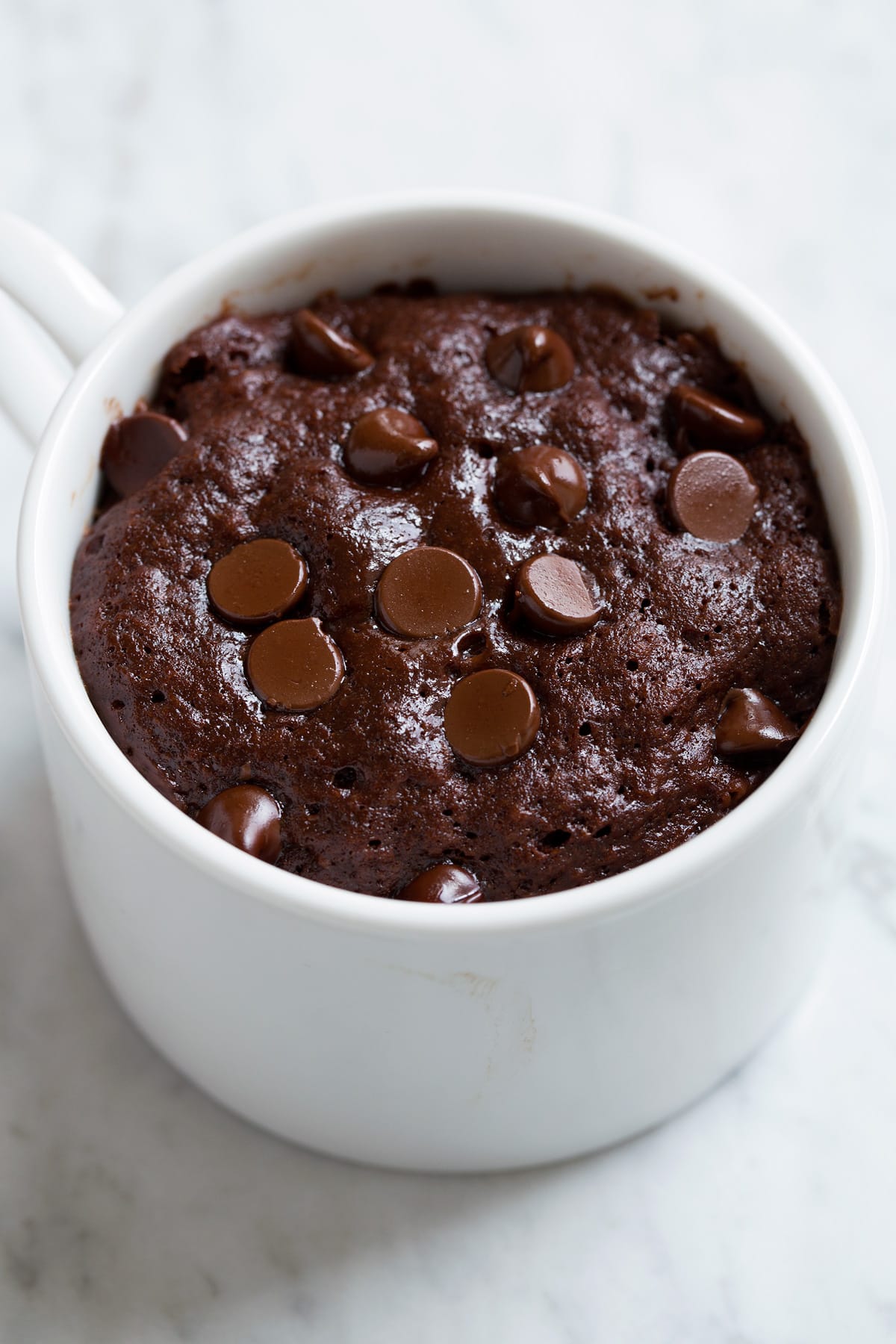 Chocolate Mug Cake shown just after cooking in the microwave. 