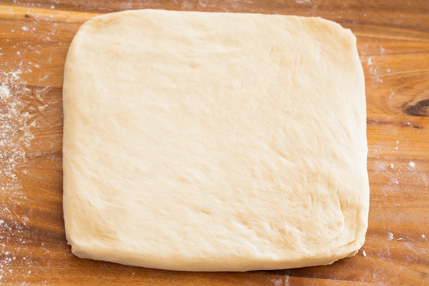 Rolled out quare dough.